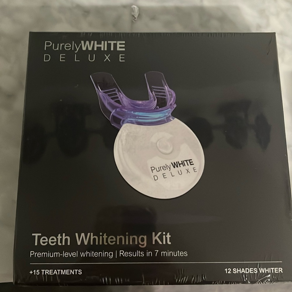 Purely white deluxe teeth whitening kit has 15 treatments & purely white refill